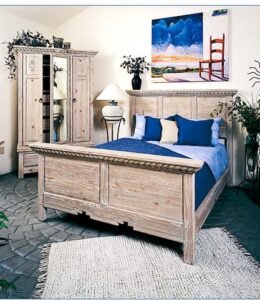 clean bedroom. Includes slay bed with blue comforter.