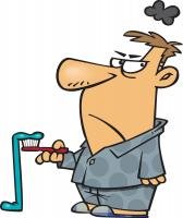 comic style drawing of a man looking disgusted holding a toothbrush with toothpaste running off of it.